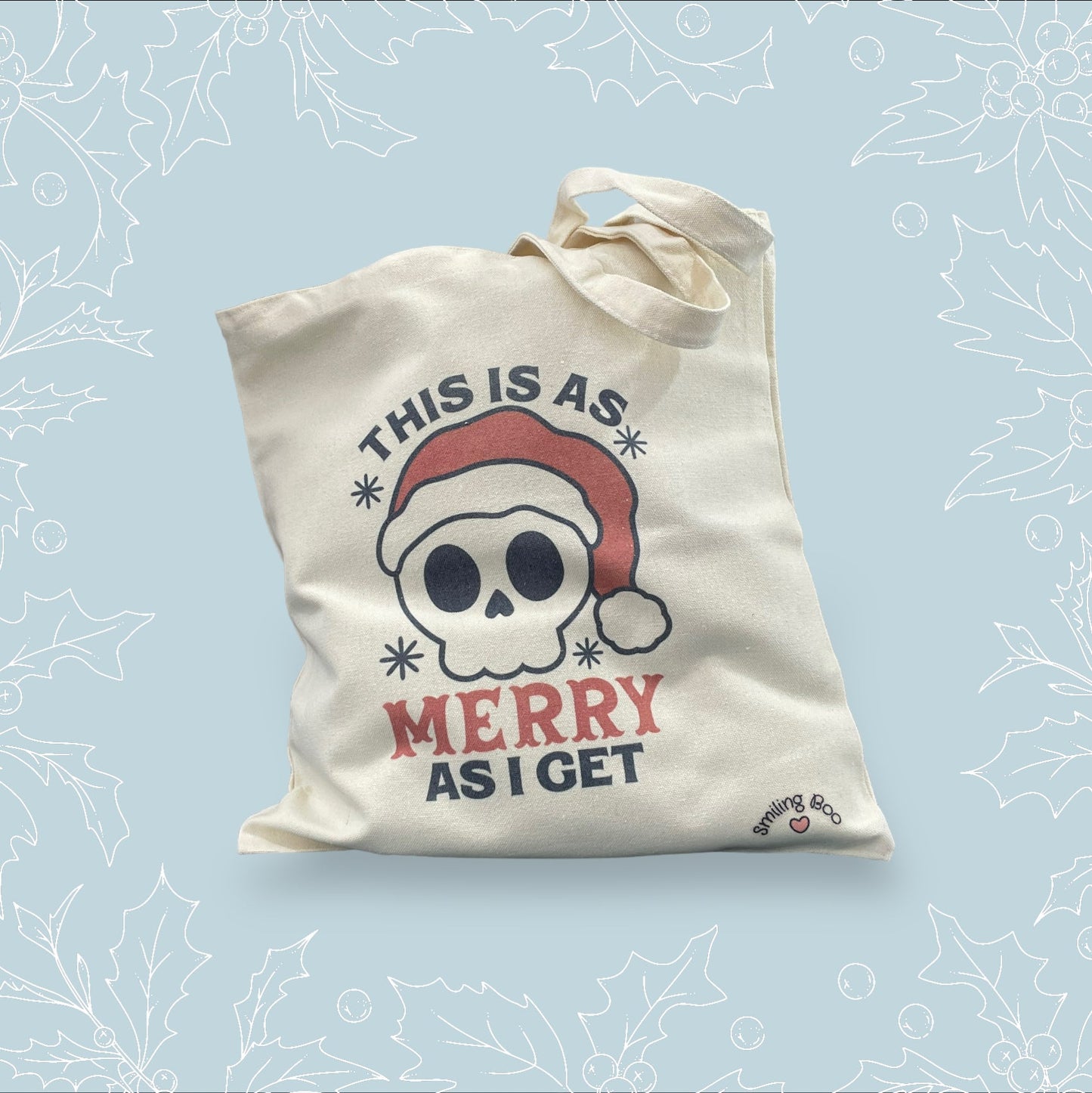 Canvas tote bag with ‘This is as merry as I get’ on it with a skull wearing a Santa hat on