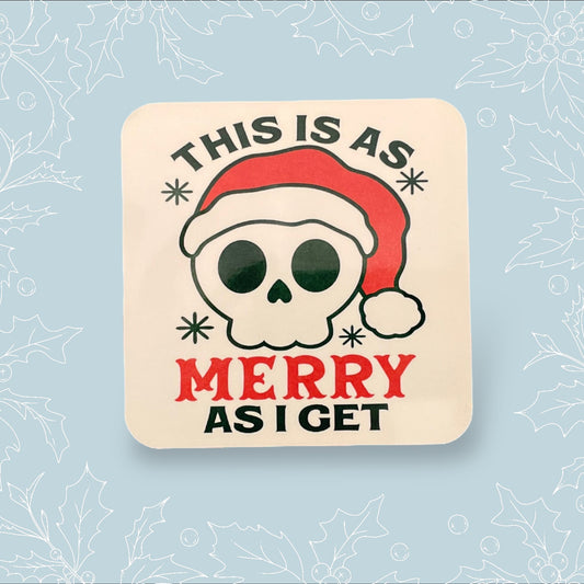 Square coaster with ‘This is as merry as I get’ on it with a skull wearing a Santa hat on