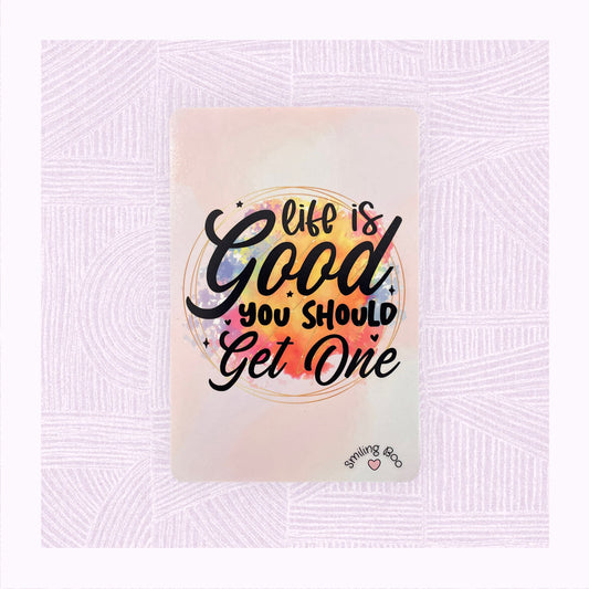Postcard art print with printed pastel background, and a colourful watercolour patch with the phrase ‘Life is Good. You should get one’.
